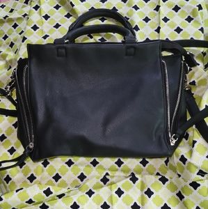 Small black purse with Handles & Detachable shoulder strap.